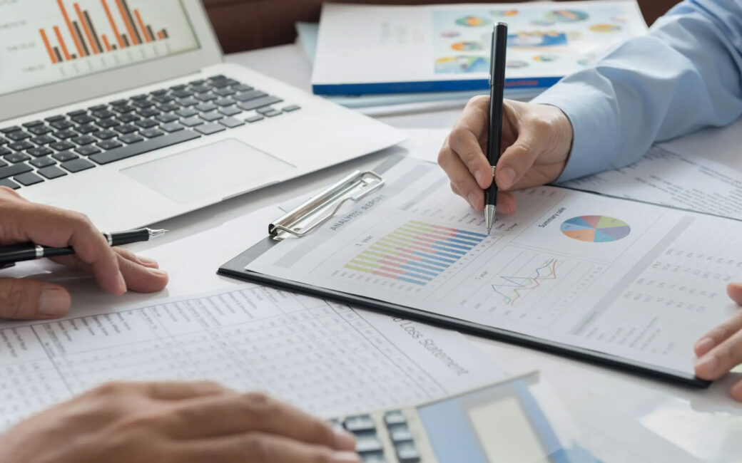 Advisor explaining a financial chart to client